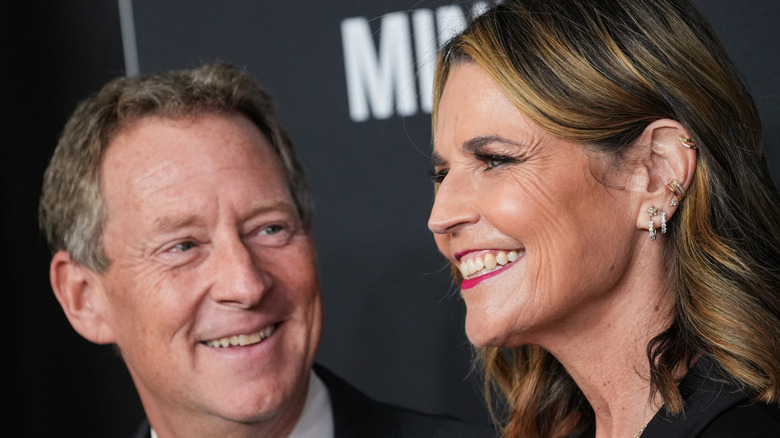 Michael Feldman looking at Savannah Guthrie