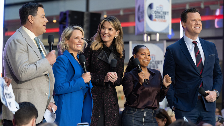 Savannah Guthrie smiling with "Today" colleagues