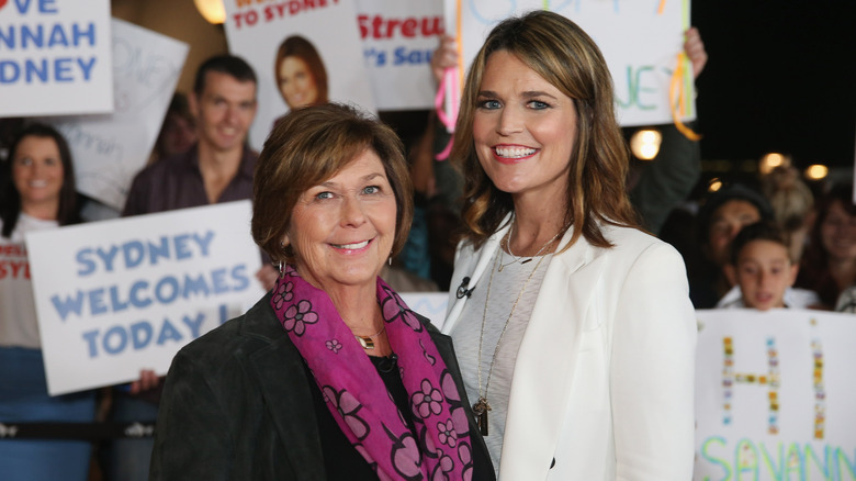 Nancy and Savannah Guthrie smiling while posing together at an event