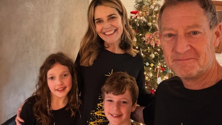 Savannah Guthrie poses with husband Mike Feldman and children