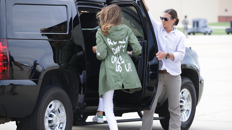 Melania Trump climbs in car