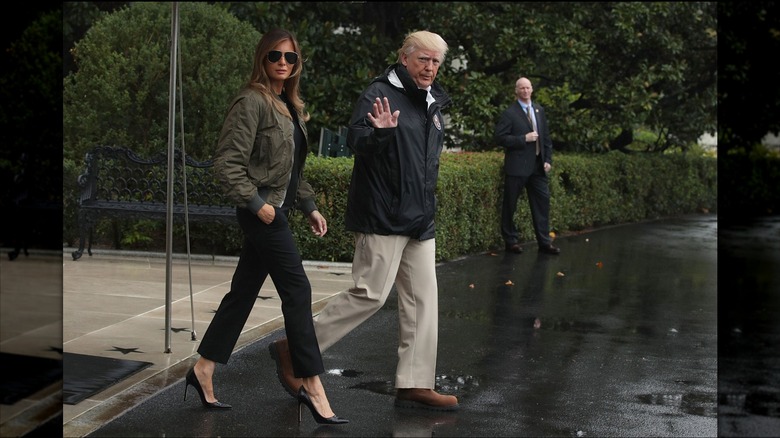 Melania Trump walks with husband Donald