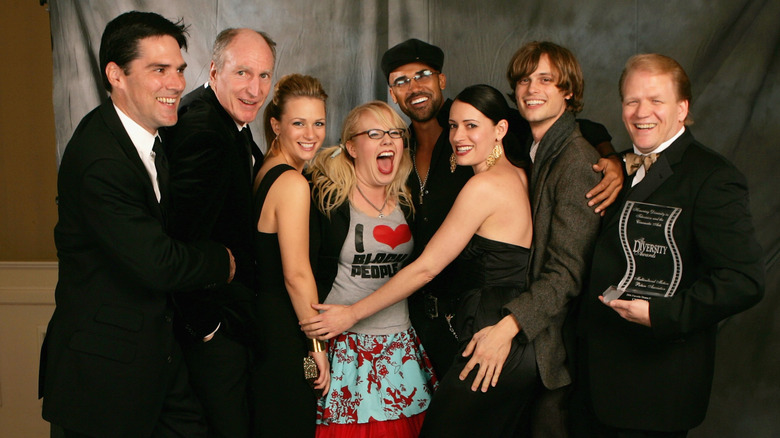 The cast of Criminal Minds posing at a gala