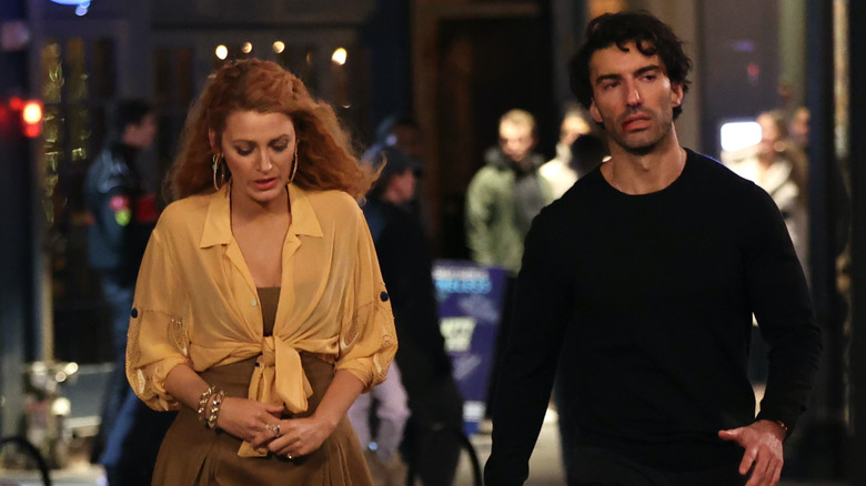 Blake Lively walking alongside Justin Baldoni