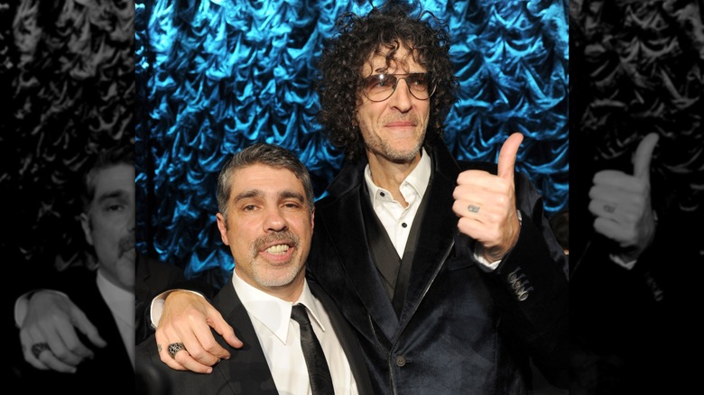 Gary Dell'Abate and Howard Stern smiling at the latter's birthday bash in 2014