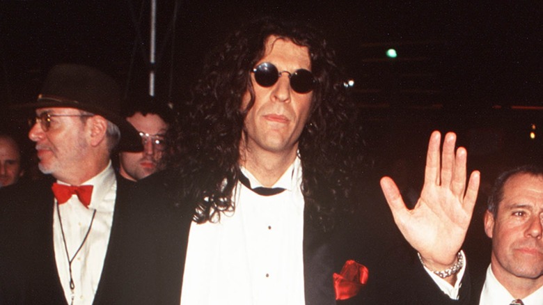 Howard Stern waving as he walks down the red carpet in New York, circa 1992