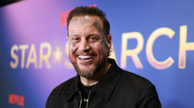 Jelly Roll smiling black shirt