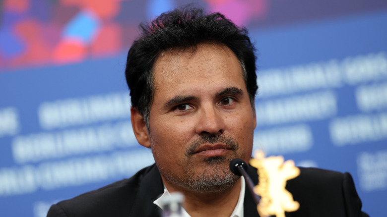 Closeup of Michael Peña at a press conference