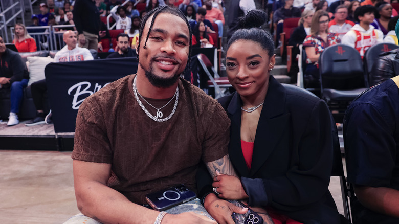 Simone Biles and Jonathan Owens attend a game between the Houston Rockets and the Los Angeles Lakers at Toyota Center on January 29, 2024 in Houston, Texas