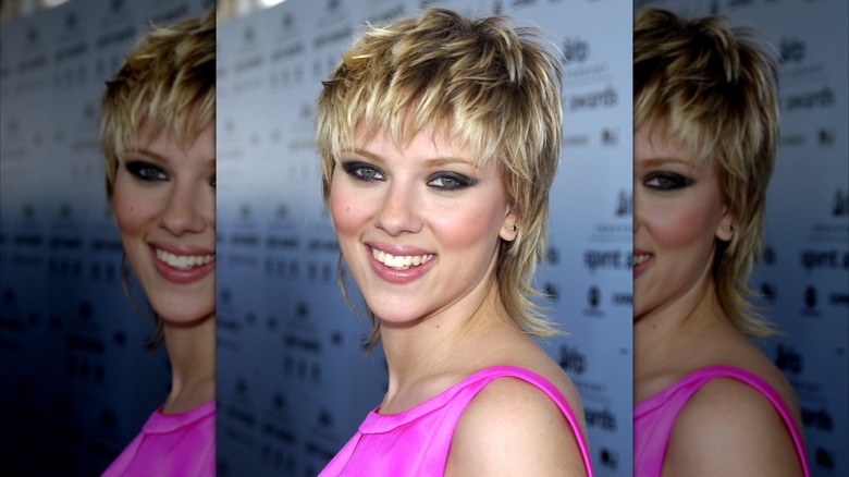 Scarlett Johansson attending the 2003 Independent Spirit Awards with a mullet and blond highlights