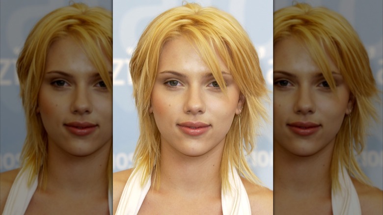 Scarlett Johansson at the 2003 Venice International Film Festival with warm blonde hair