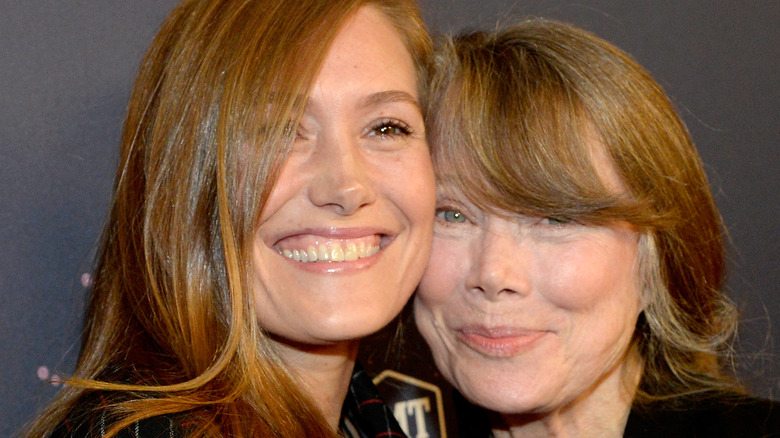 Schuyler Fisk and Sissy Spacek smiling on the red carpet