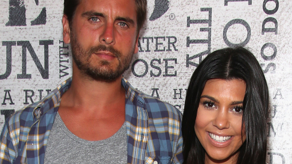 Scott Disick and Kourtney Kardashian pose together