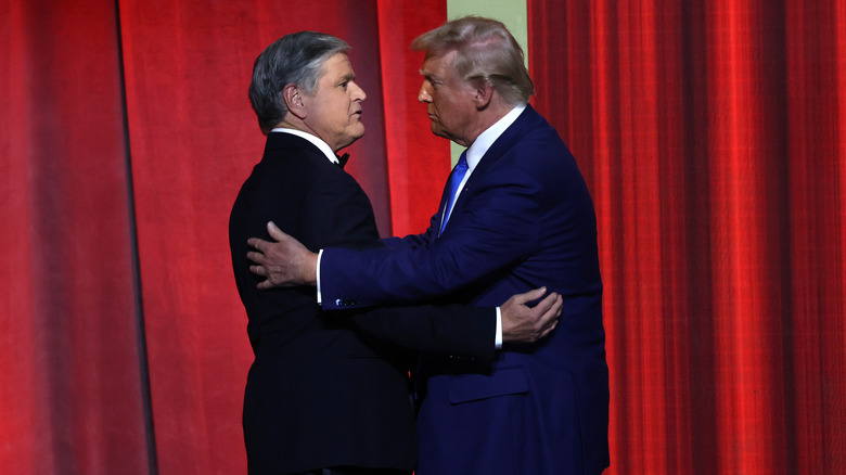 Sean Hannity and Donald Trump holding each other