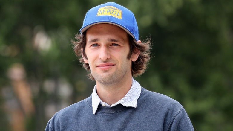 Hopper Penn wearing a baseball cap