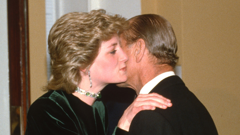 Princess Diana embracing Prince Philip