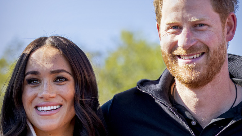 Meghan and Harry smiling