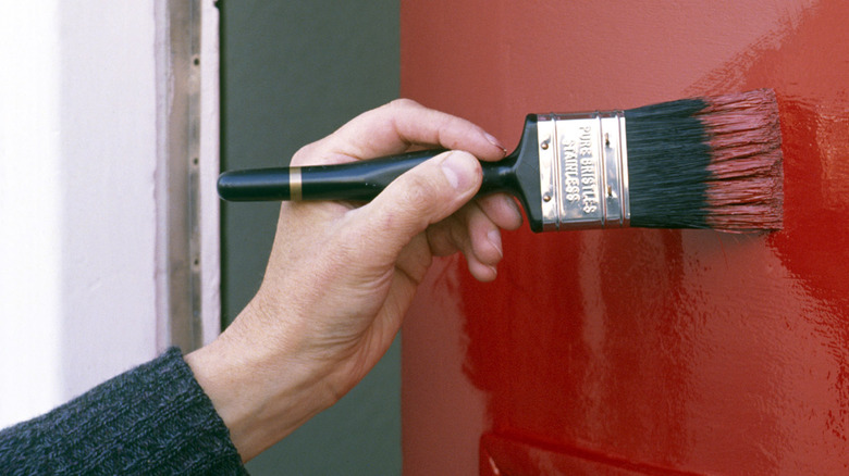 paint cans next to paint swatches