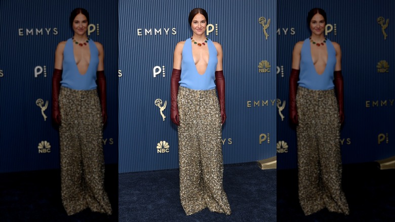 Shailene Woodley in a blue tank top and shimmer pants
