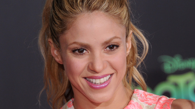 Shakira smiling on the red carpet