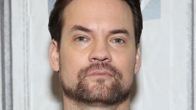 Shane West posing for press