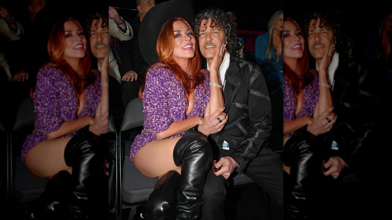 Shania Twain touches Frédéric Thiébaud's face and cuddles close