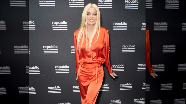 Shania Twain in an orange outfit