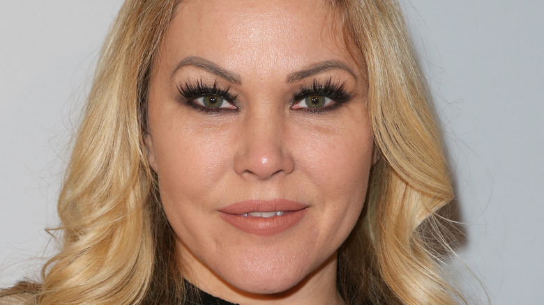 Shanna Moakler smiling on the red carpet. 