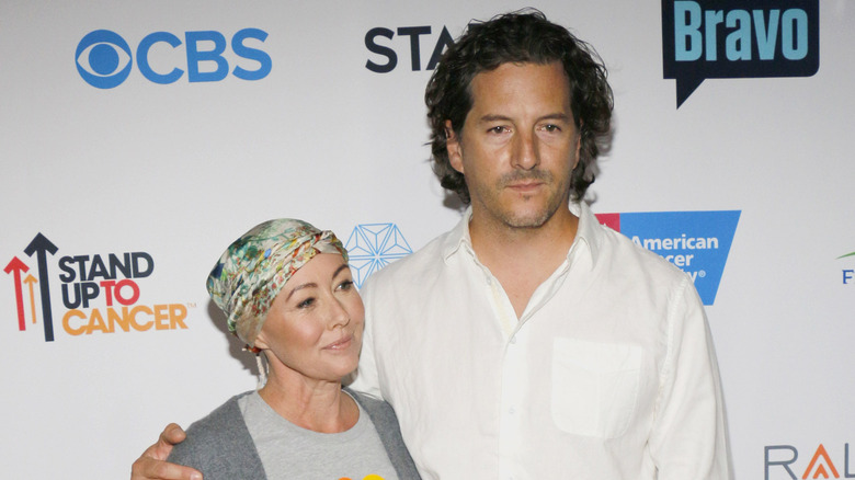 Kurt Iswarienko and Shannen Doherty standing together