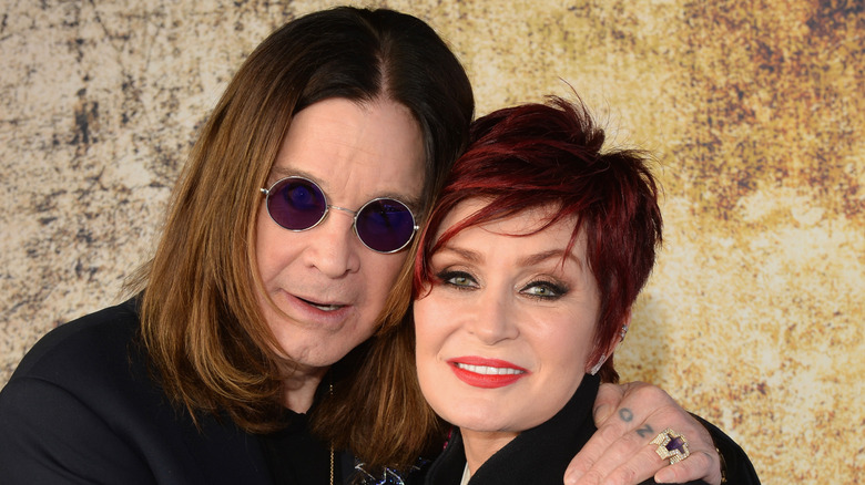 Ozzy and Sharon Osbourne smiling
