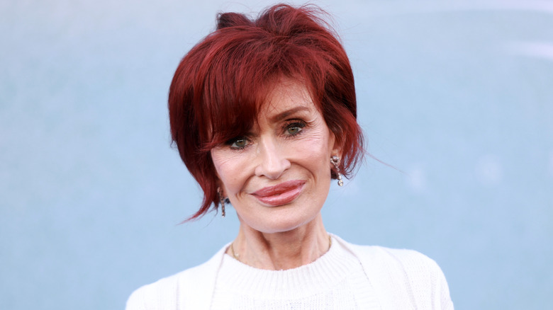 Sharon Osbourne smiling with red hair on June 17, 2024