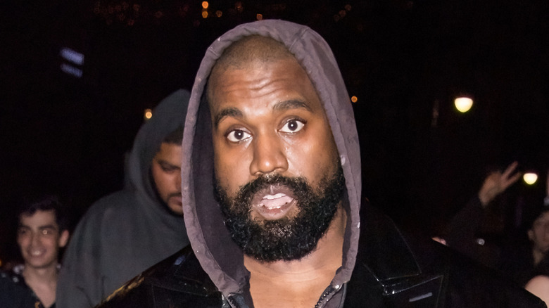 Kanye West photographed outside a car