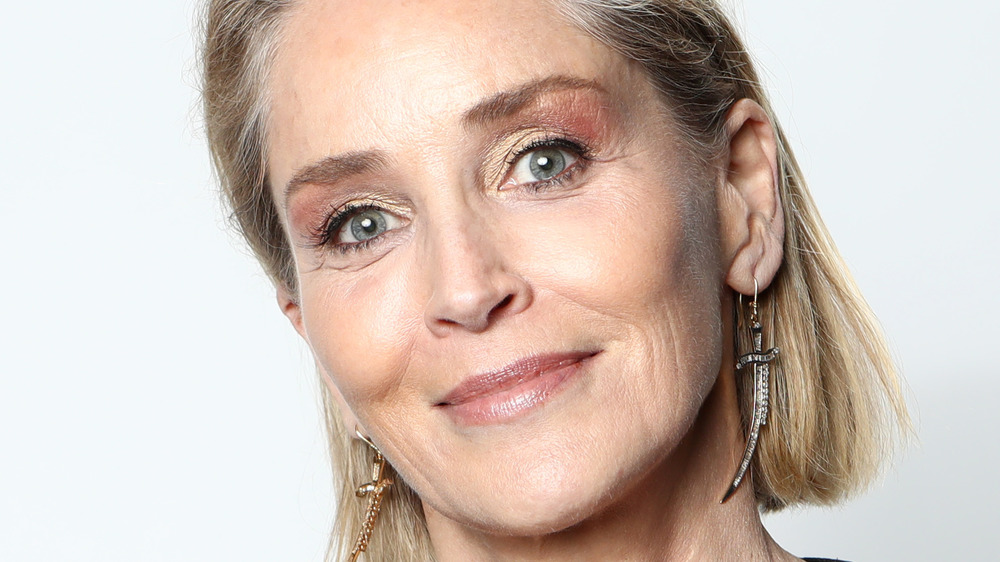 Sharon Stone wearing dagger earrings