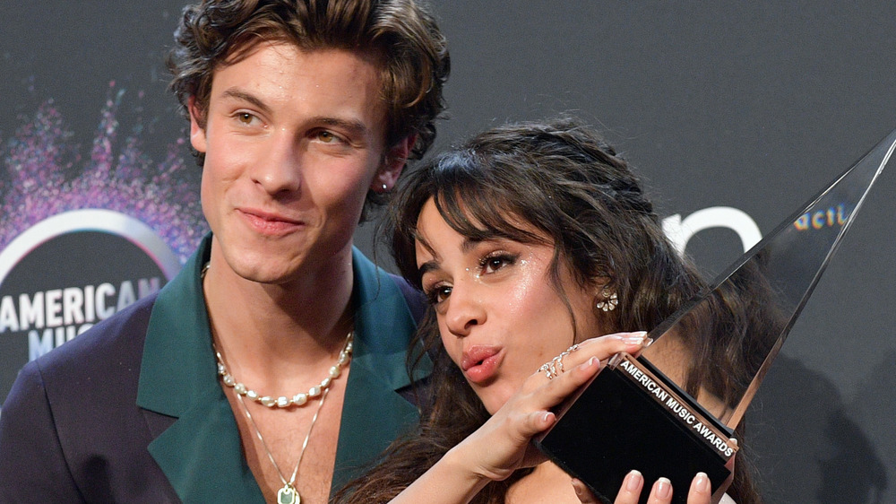 Shawn Mendes and Camillo Cabello posing at AMAs