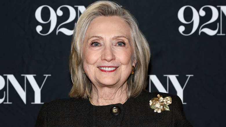image of Hillary Clinton smiling and looking at the camera at an event