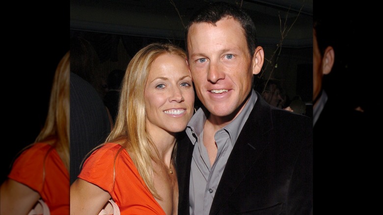 Sheryl Crow and Lance Armstrong smiling at a pre-Grammys event