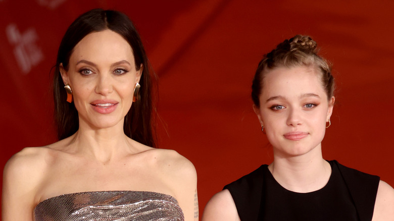 Angelina and Shiloh Jolie smiling