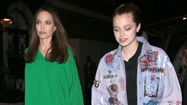 Angelina and Shiloh Jolie walking