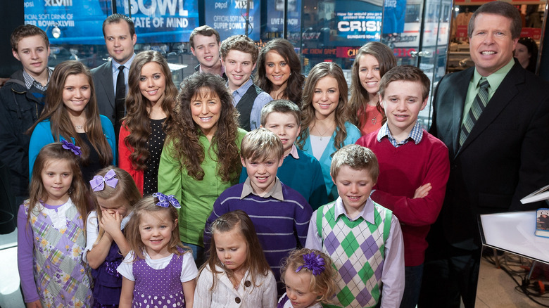 The Duggar family posing