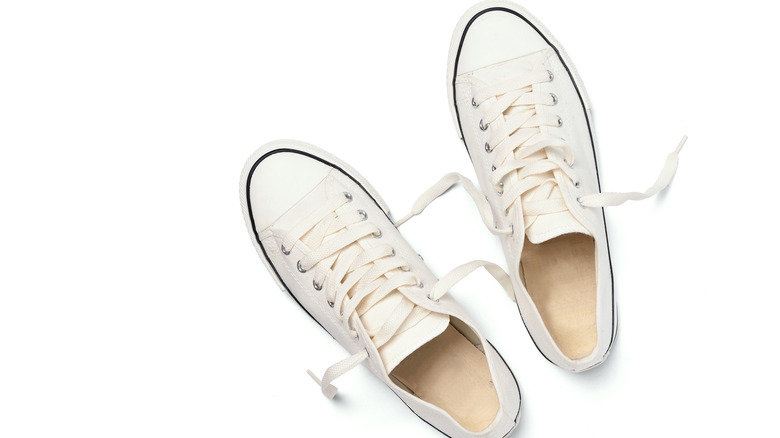 white sneakers on background 
