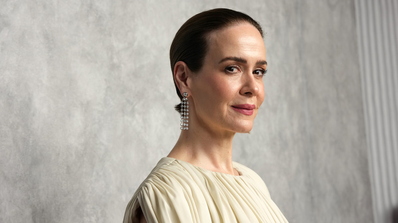 Sarah Paulson in a cream dress