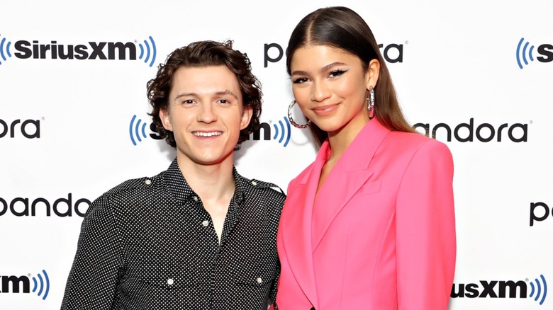 Tom Holland and Zendaya at event