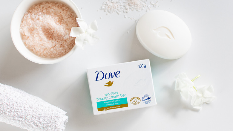 Dove Beauty Bar sitting next to bath products