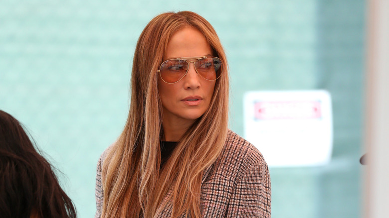 Jennifer Lopez wearing sunglasses.