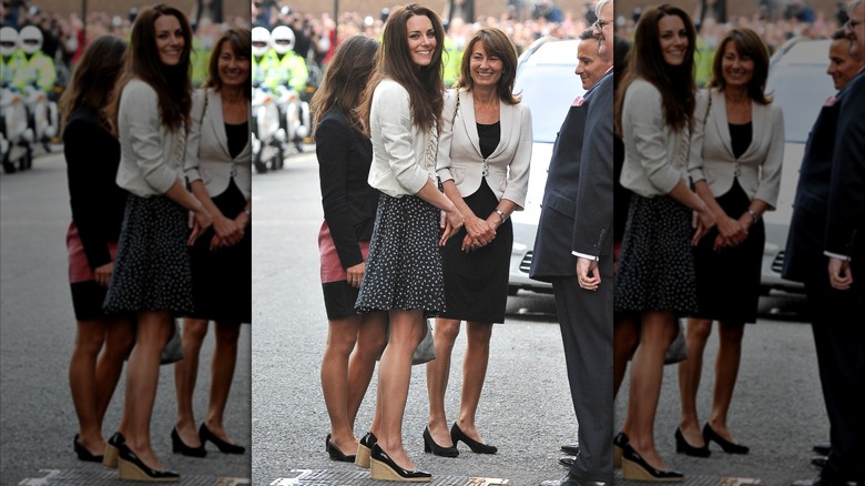 Kate, Pippa, and Carole Middleton checking into their hotel together the day before the royal wedding