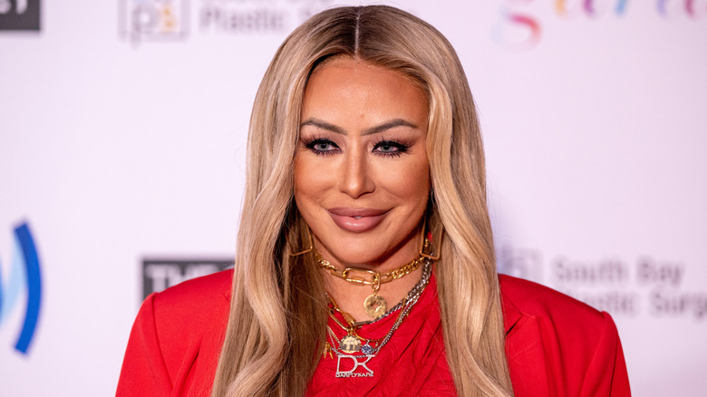Aubrey O'Day wearing red