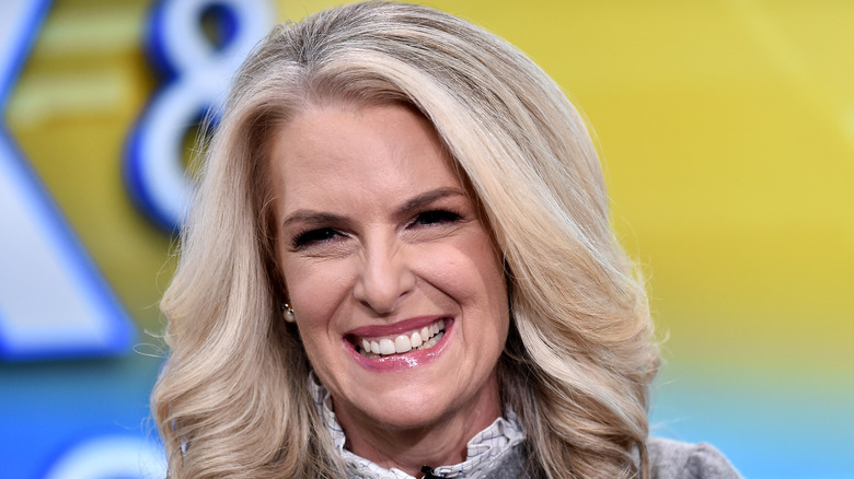 Janice Dean smiling in a gray sweater while on 'Fox & Friends.'