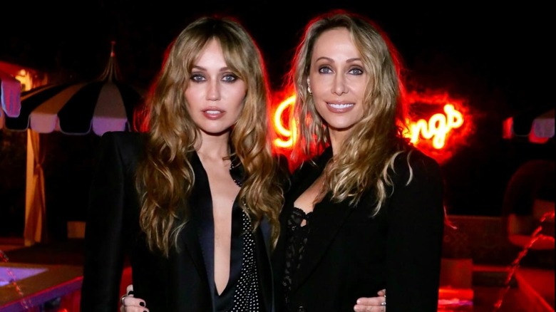 Miley Cyrus and Tish Cyrus posing together