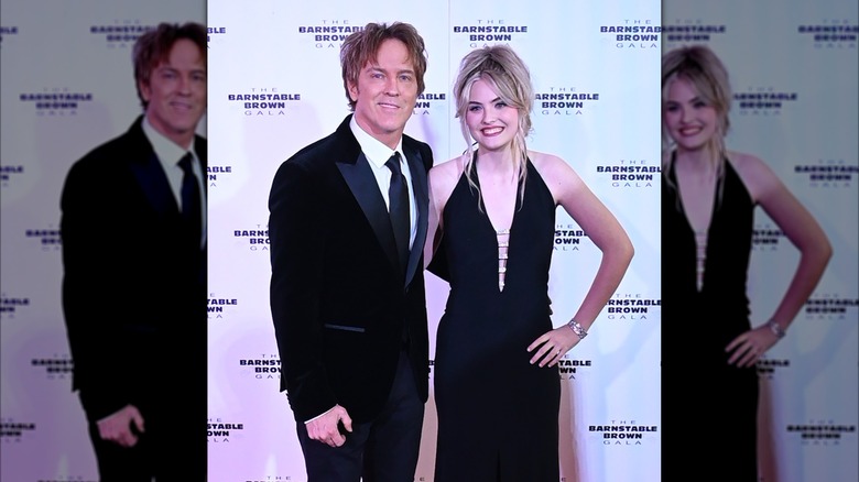Larry Birkhead and Dannielynn Birkhead smiling on the red carpet