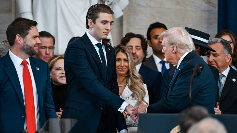 Barron Trump shakes his father's hand